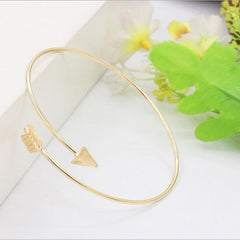 'Cupid's arrow' bangle in gold and silver