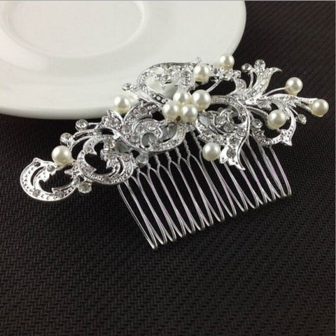 Silver ornamented hair comb