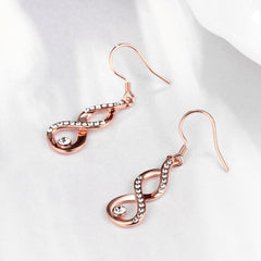 Spiral-shaped drop earrings in rose gold