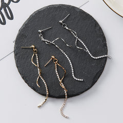 Spiral-shaped drop earrings in gold